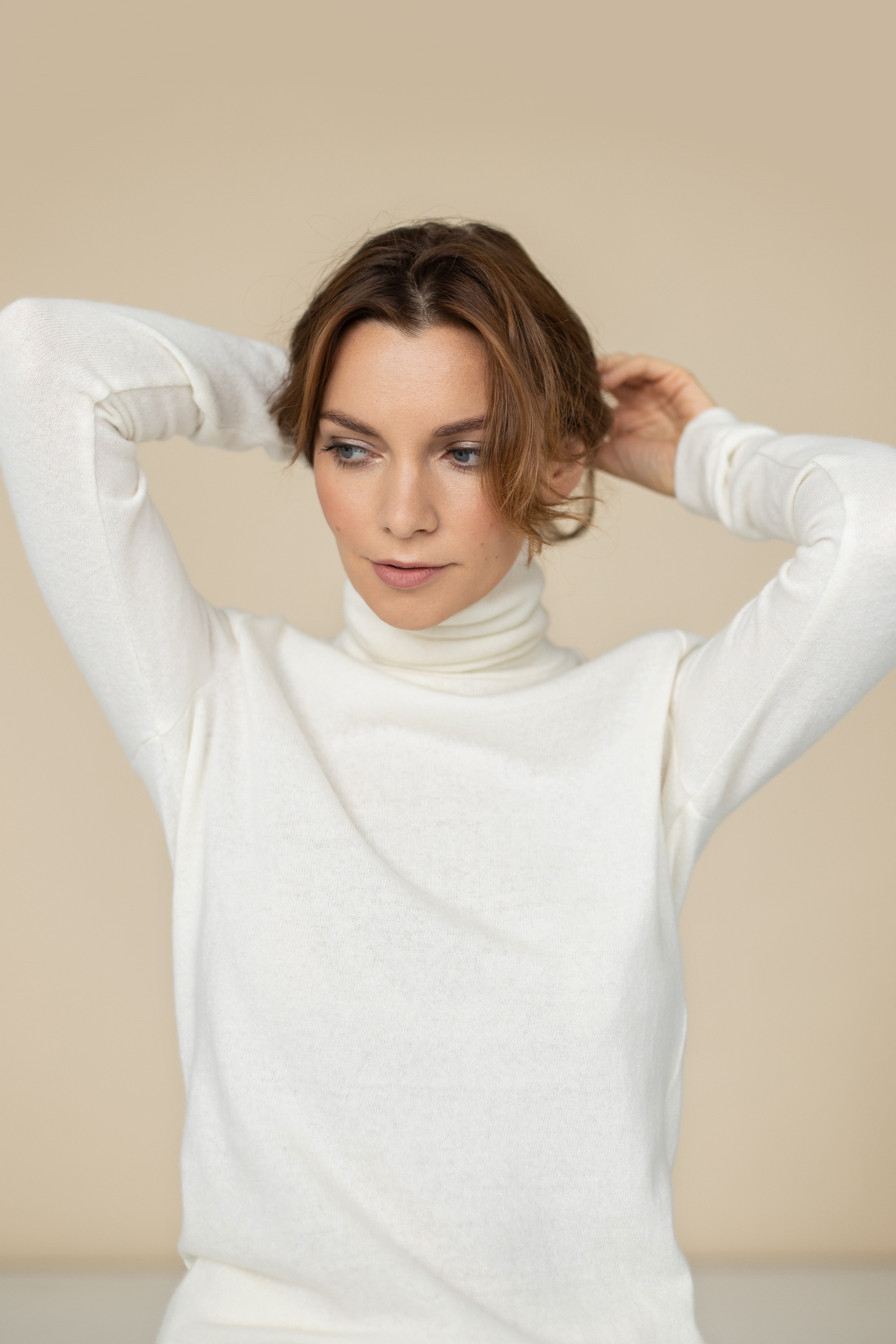 Gaudium Turtleneck Sweater in Ivory White